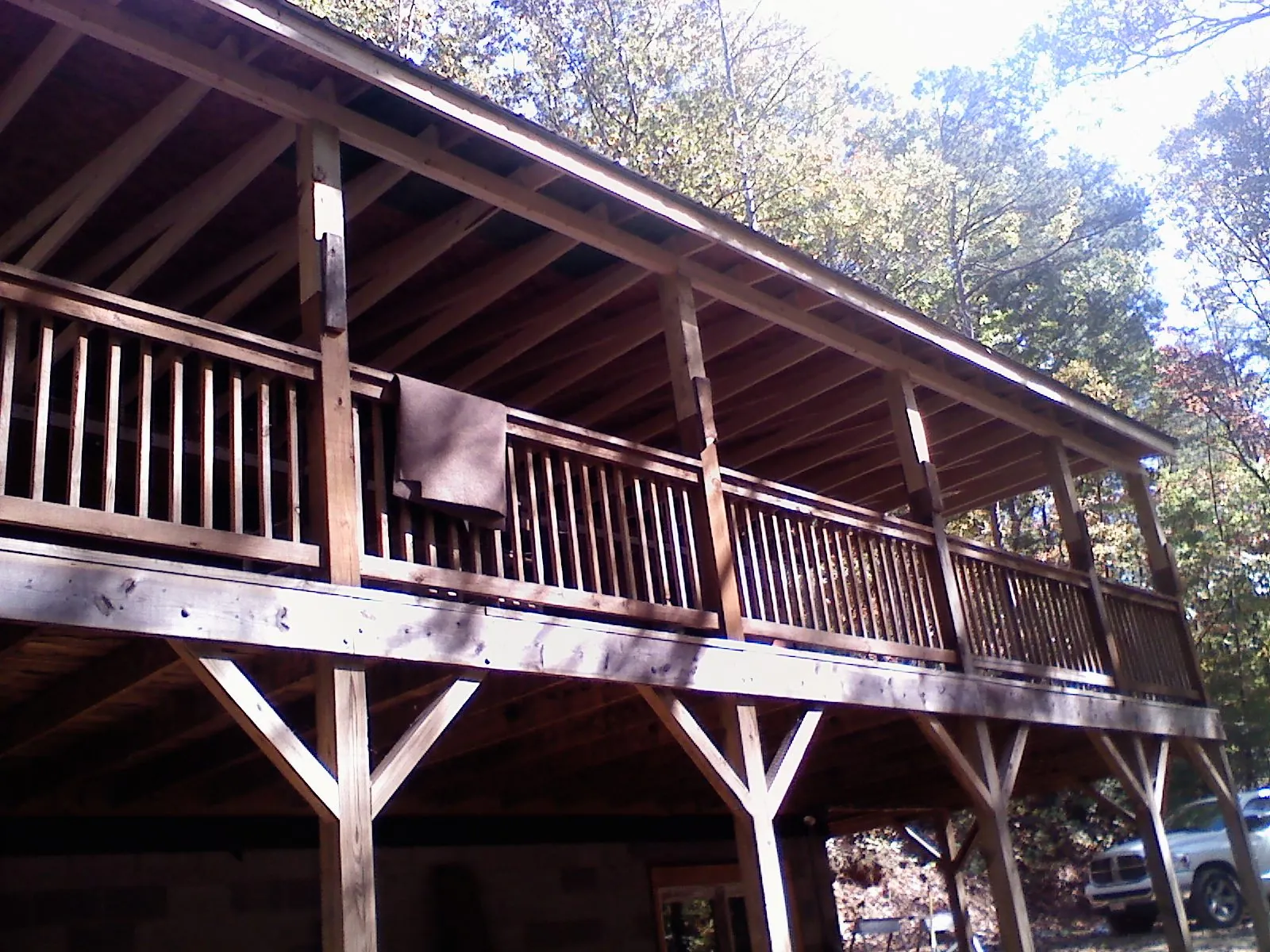 Timber framing under a new elevated porch and deck — Roof Leak Repair in Waupun by Roofing Brothers